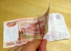 В городе Советский выявлен второй факт сбыта поддельной пятитысячной купюры