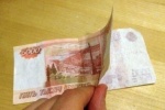 В городе Советский выявлен второй факт сбыта поддельной пятитысячной купюры